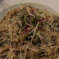 Steak Tenderloin Pasta · Campanelle pasta, crimini mushrooms, spinach, toasted hazelnuts, parmesan cheese and brandy ...