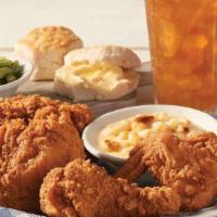 Southern Fried Chicken · Four pieces of bone-in fried chicken with honey, served with two Country Sides and Buttermil...