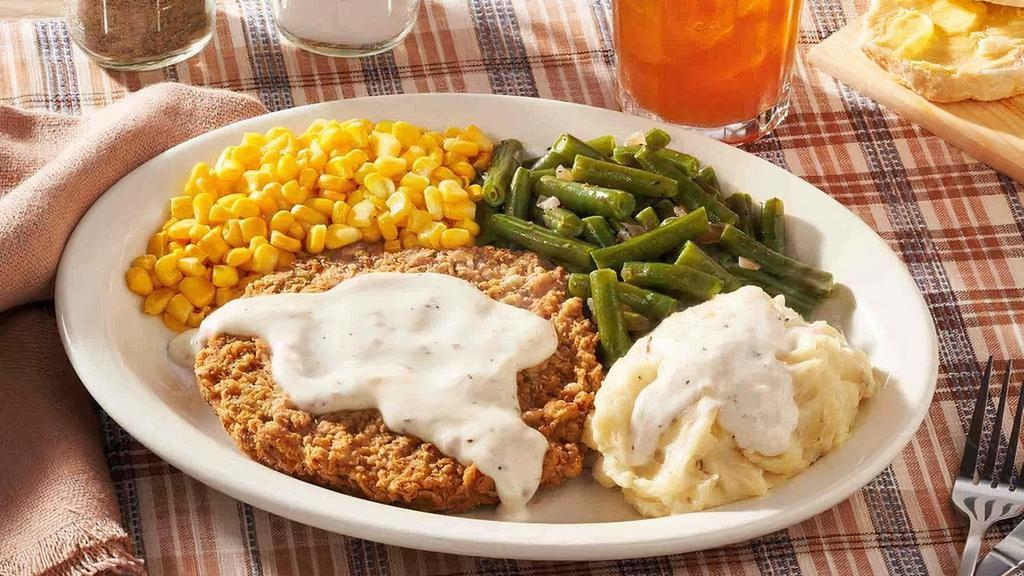 Country Fried Steak · USDA Choice steak fried and topped with Sawmill Gravy. Served with your choice of 2 or 3 Country Sides and hand-rolled Buttermilk Biscuits (160 cal each) or Corn Muffins (210 cal each)..