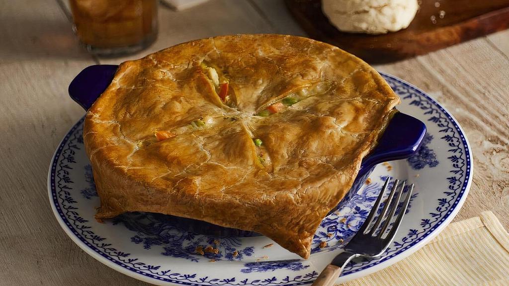 Chicken Pot Pie · Our new recipe for a fresh-baked comfort food favorite, with slow-simmered chicken, peas, carrots, celery, potatoes, and onions in a creamy sauce topped with flaky pastry crust. Comes with your choice of hand-rolled Buttermilk Biscuits (160 cal each) or Corn Muffins (210 cal each)..