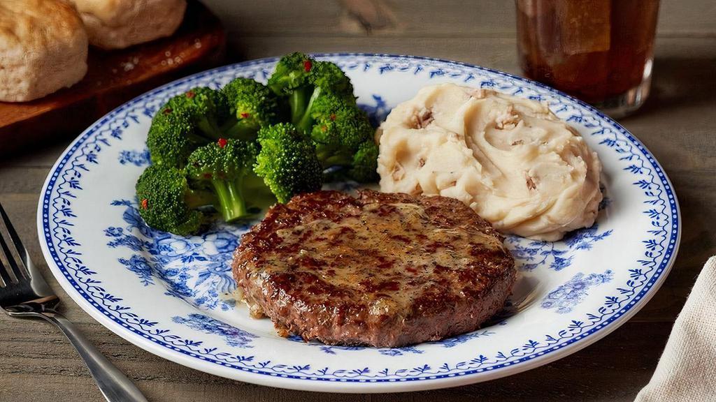 Hamburger Steak** · Half-pound Hamburger Steak with garlic butter plus choice of two Country Sides. Served with hand-rolled Buttermilk Biscuits (160 cal each) or Corn Muffins (210 cal each)..