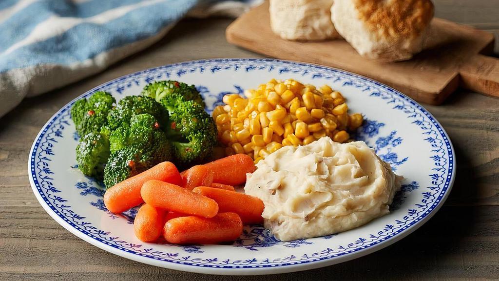 Country Vegetable Plate · Choice of four Country Sides. Served with Buttermilk Biscuits (160 cal each) or Corn Muffins (210 cal each)..