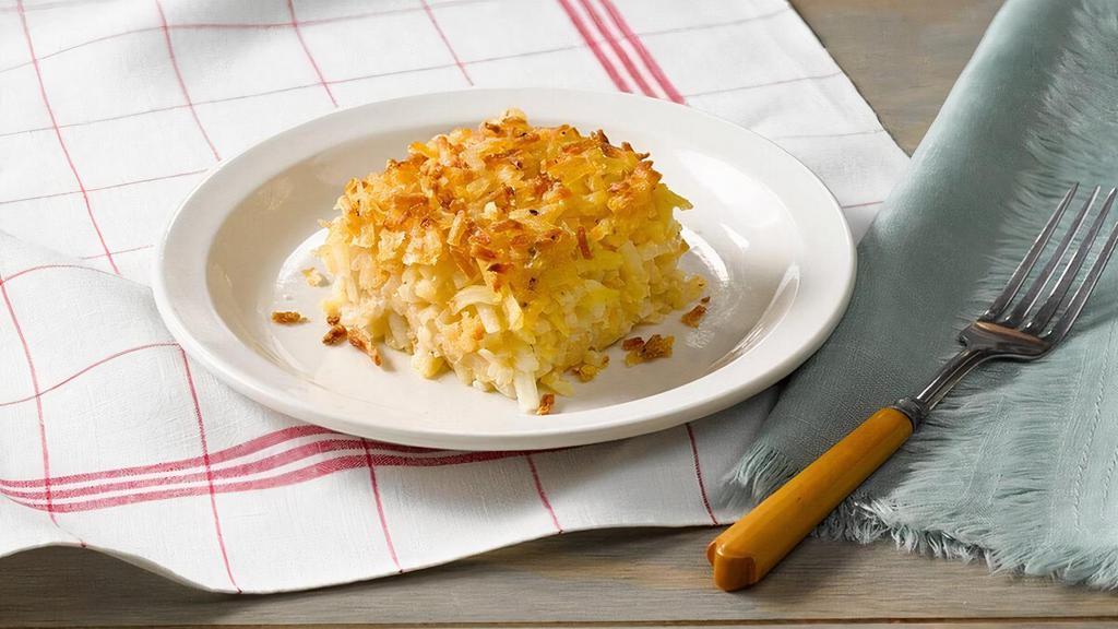 Hashbrown Casserole · Shredded potatoes, Colby cheese, chopped onions, our signature seasoning blend, salt and pepper baked together in the oven for our Signature Hashbrown Casserole..