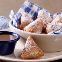 Biscuit Beignets · Our buttermilk biscuit dough, deep-fried then tossed in cinnamon sugar with. butter pecan sa...