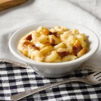 Macaroni N' Cheese · Elbow Macaroni Noodles mixed with cheese and baked in the oven for our signature Macaroni n'...