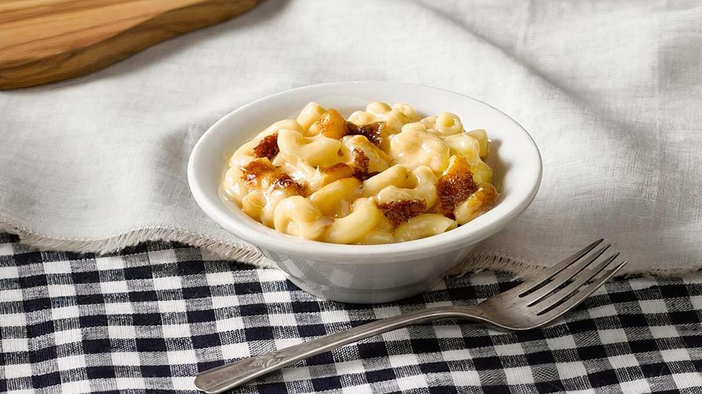 Macaroni N' Cheese · Elbow Macaroni Noodles mixed with cheese and baked in the oven for our signature Macaroni n' Cheese..