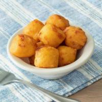 Hashbrown Casserole Tots · Our Hashbrown Casserole fried into crispy bite-sized tater tots loaded with bacon and melted...