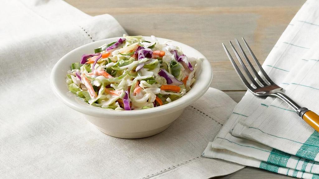 Cole Slaw · A mix of green cabbage, red cabbage and carrots tossed in a Coleslaw dressing..