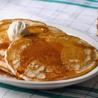 Buttermilk Pancakes With 100% Pure Natural Syrup · Enjoy three golden Buttermilk Pancakes n’ butter. Plus 100% Pure Natural Syrup..