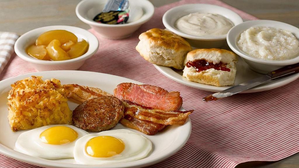 Sunrise Sampler® · Two farm fresh eggs* served with grits, Fried Apples, and Hashbrown Casserole plus a sampling of Thick-Sliced Bacon, Smoked Sausage and Country Ham. Comes with Buttermilk Biscuits (160 cal each) and Sawmill Gravy (160 cal)..