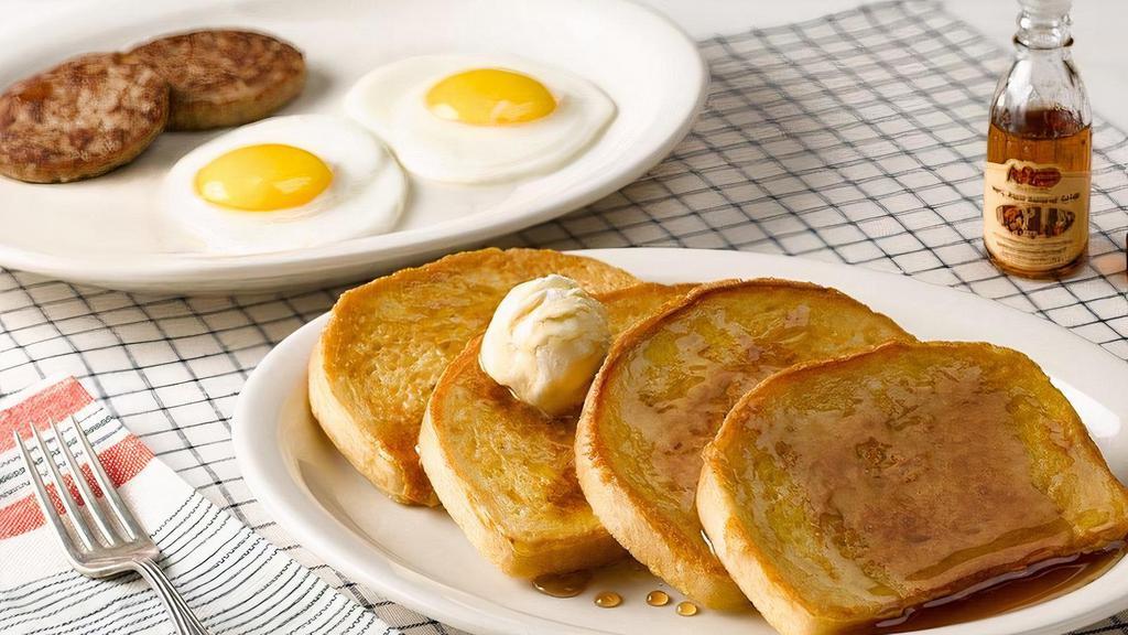 Momma'S French Toast Breakfast® · Four slices of our Sourdough bread, hand-dipped in eggs and grilled, topped with butter and served with two eggs.*  Plus Thick-Sliced Bacon or sausage (110-240 cal) and 100% Pure Natural Syrup..