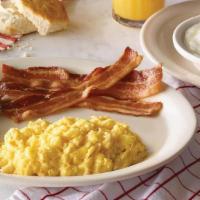 Double Meat Breakfast · Starts with three eggs* with grits plus a full order of Thick-Sliced Bacon and Smoked Sausag...