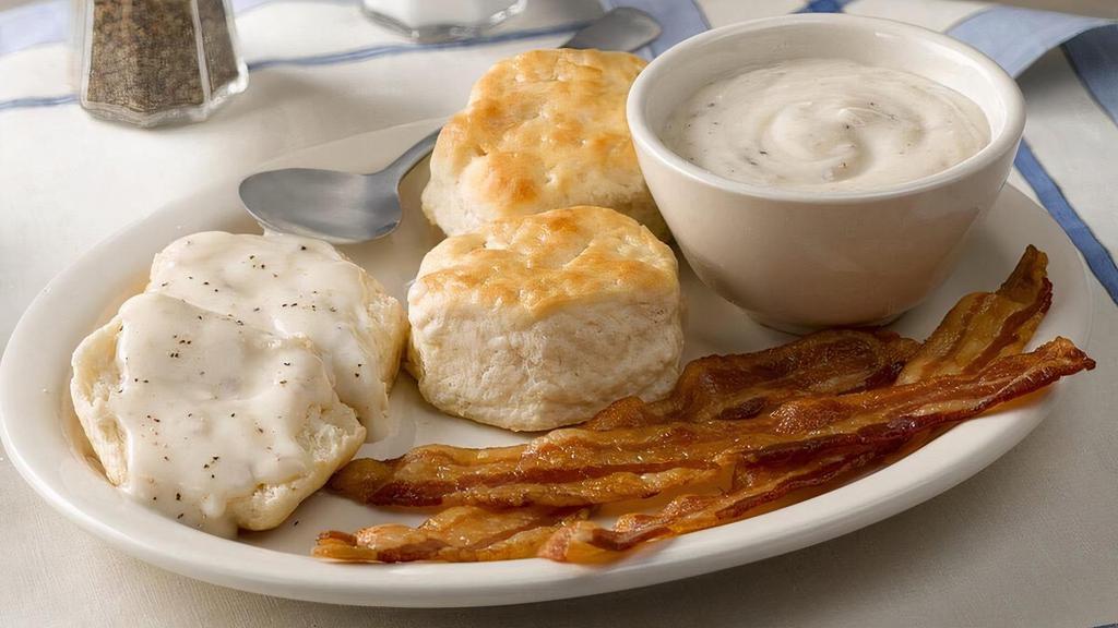 Biscuits N' Gravy With Bacon Or Sausage · Three hand-rolled Buttermilk Biscuits with our special Sawmill Gravy. Plus Thick-Sliced Bacon or Smoked Sausage Patties (110-240 cal)..