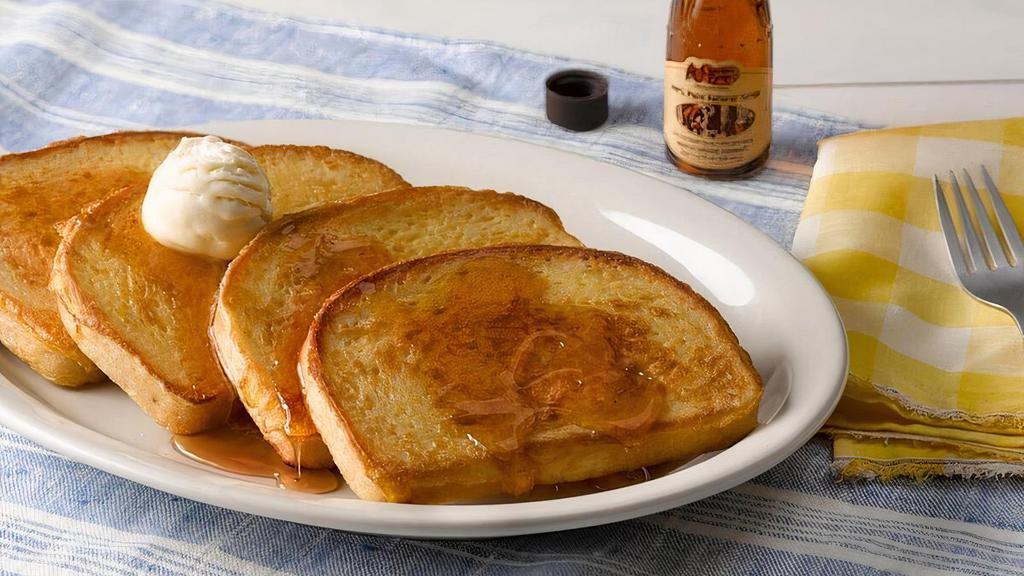 French Toast · Four slices of our Sourdough bread, grilled and topped with butter. Plus 100% Pure Natural Syrup or any fruit Sweet Topping (320/410 cal).