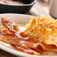 Bacon Or Sausage With Fried Apples Or Hashbrown Casserole · Your choice of bacon or sausage (110-240 cal) plus choice of Fried Apples or Hashbrown Casse...