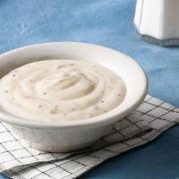 Sawmill Gravy · Sawmill Gravy seasoned and cooked with pork flavors, salt and black pepper..