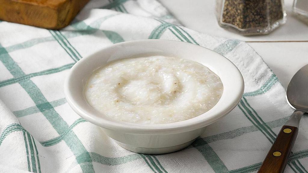 Coarse Ground Grits · Coarse Ground Grits slow cooked with margarine and salt..
