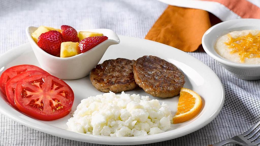 Good Morning Breakfast · Two Scrambled Egg Whites, grits, a side of Fresh Seasonal Fruit, sliced tomatoes and Turkey Sausage..