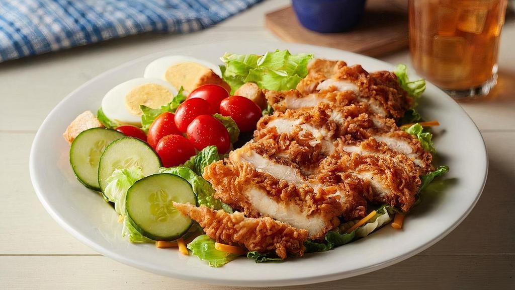 Homestyle Chicken Salad · Crispy, golden-fried Sunday Homestyle Chicken® (930 cal) or Smoky Southern grilled chicken breast (550 cal) over fresh greens with cucumbers, tomatoes, shredded Colby cheese, house-baked Sourdough croutons, boiled eggs and a Colby cheese wedge plus Westminster Crackers..