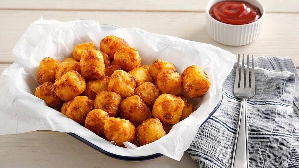Hashbrown Casserole Tots · Serves 5 | Our hashbrown casserole is fried into crispy bite-sized tater tots..
