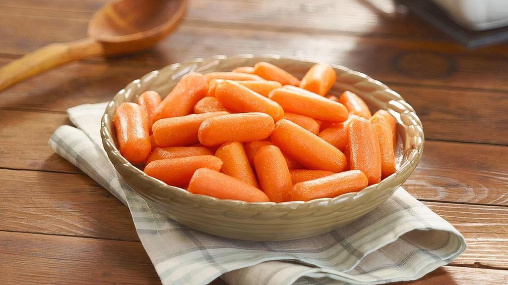 Carrots · Whole baby carrots cooked with a hint of margarine and brown sugar. Packed hot and ready to serve..