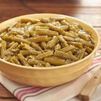 Green Beans  · Greens Beans slow simmered with a hint of pork seasoning. Packed hot and ready to serve. .