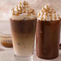 Iced Caramel Latte · Traditional Espresso Latte served over ice with Caramel flavoring..