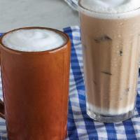 Iced Latte · Traditional Espresso Latte served over ice..