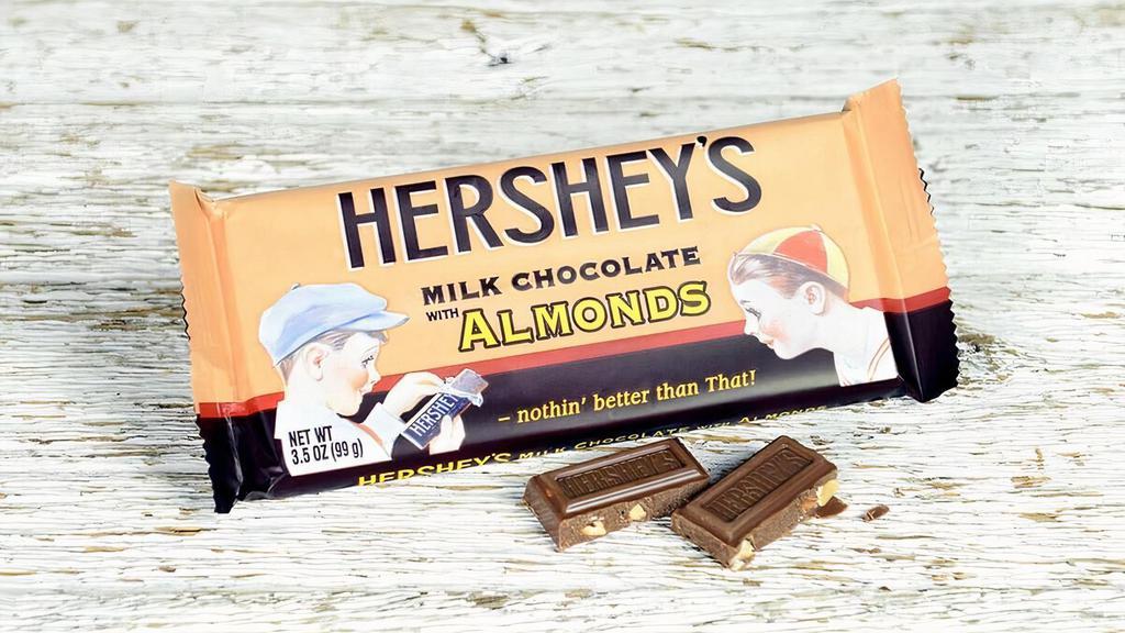Hershey® Milk Chocolate Bar With Almonds · Chocolate lovers will seriously love this colossal candy bar, made with creamy HERSHEY'S Milk Chocolate and almonds. HERSHEY'S Giant Milk Chocolate with Almonds Bar is perfect as a present, especially when you’re the recipient!