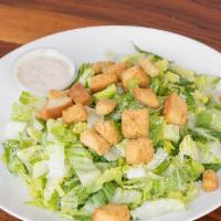 Caesar Salad  · Romaine lettuce, parmesan , croutons, Caesar dressing.  Add avocado,  or grilled chicken for...