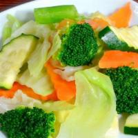 Steamed Vegetables · Mixture of cabbage, carrots, broccoli, and zucchini.