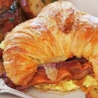 Warm Croissants With Eggs, Ham & Cheese · 