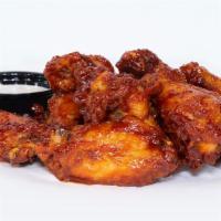 Bbq Wings · Crispy wings tossed with Haus BBQ sauce
