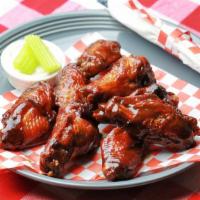 8 Pcs Wings · Chicken wings cooked to perfection with  2 flavors & 1 dipping sauce.