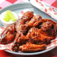 10 Pc Wing  · Chicken wings cooked to perfection with  2 flavors & 1 dipping sauce.