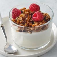 Granola Parfait Breakfast · Yogurt topped with fresh fruit and granola.
