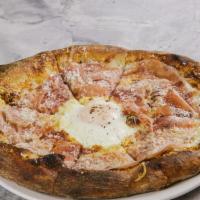 Prosciutto & Egg · Four cheese, sunny-side-up egg, parmesan cream and chili flake on hand-stretched artisan cru...