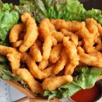 Panko Crusted Calamari · Flash-fried and served with a pimiento horseradish sauce.  Recipe includes eggs, fish, wheat...