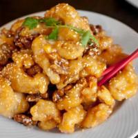 Honey Walnut Chicken · Lightly fried and glazed with honey sauce, walnuts and sesame seeds.  Recipe includes eggs, ...