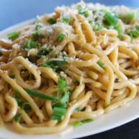 Garlic Noodles · Lo Mein noodles wok-fired with butter garlic sauce and garnished with sesame seeds, Parmesan...