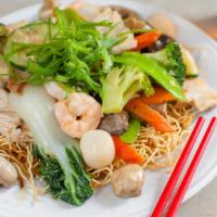 Hk Chow Mein · Shrimp, scallops, chicken, barbecued pork and vegetables over Hong Kong Style crispy wok-fir...