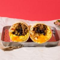 Breakfast Burrito · Chorizo, carnitas, or Asada with eggs, cheese, pico de gallo, rice, and beans. Served with s...