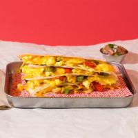 Vegetarian Breakfast Quesadilla · Eggs, sauteed onions and peppers, and melted cheese on a tortilla. It comes with pico de gal...