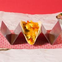 Vegetarian Breakfast Tacos (3 Tacos) · Eggs, cheese, sauteed onions and peppers, and pico de gallo. Served with salsa.