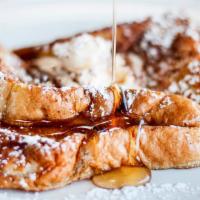Original French Toast · Sliced challah bread soaked in eggs and milk, then fried, served with a side of butter and s...