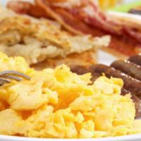 Bruin Special · Three fresh eggs, hash browns, two bacon, two sausages, and two fluffy pancakes.