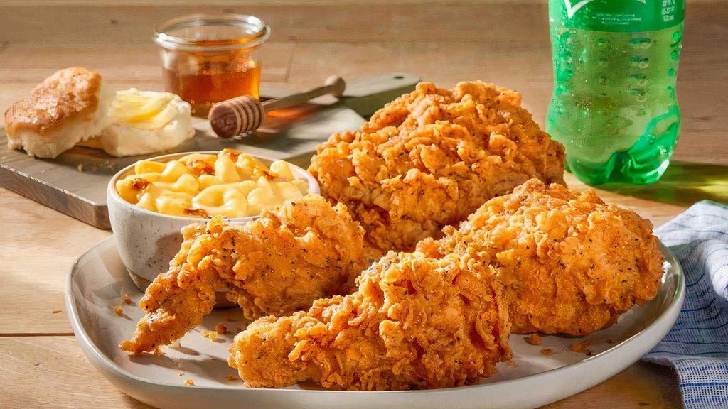 Southern Fried Chicken Combo · Four pieces of bone-in chicken, hand breaded with our signature seasoning. Comes with choice of side, honey, and Buttermilk Biscuit. Includes your choice of 20 oz bottled beverage.