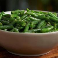 Green Beans (Large) · Homestyle green beans slow simmered with a hint of pork seasoning..