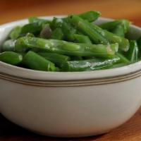 Green Beans (Individual) · Homestyle green beans slow simmered with a hint of pork seasoning..
