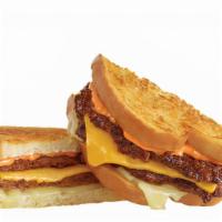 Frisco Melt · Two Steakburgers™ with American and Swiss cheeses, on buttery, grilled sourdough with our sw...